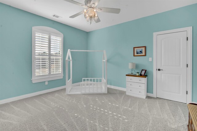 2911 Butterfield Trl, Sherman, TX 75092 - carpeted bedroom featuring baseboards and a ceiling fan
