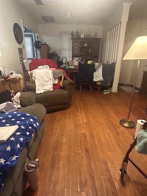 5730 Grover Pl, Shreveport, LA 71105 - living room featuring wood finished floors