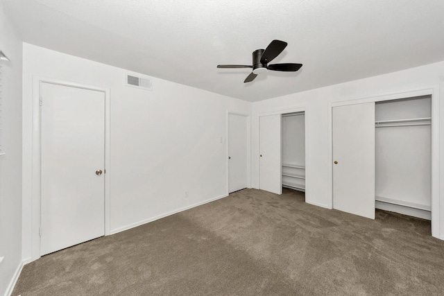 6225 Franwood Ter, Fort Worth, TX 76112 - unfurnished bedroom with multiple closets, carpet, and ceiling fan