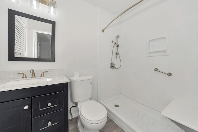 6225 Franwood Ter, Fort Worth, TX 76112 - full bath with a shower, vanity, and wood finished floors
