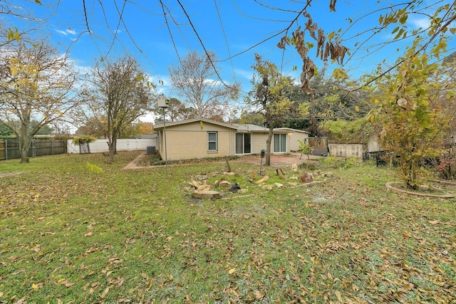 6225 Franwood Ter, Fort Worth, TX 76112 - back of property featuring a fenced backyard
