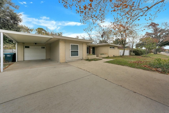 6225 Franwood Ter, Fort Worth, TX 76112 - mid-century home with driveway, brick siding, and a garage