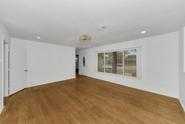 6225 Franwood Ter, Fort Worth, TX 76112 - empty room featuring wood finished floors and recessed lighting
