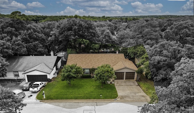 5312 Vermillion Trl, Arlington, TX 76017 - aerial view of property and surrounding area with a forest