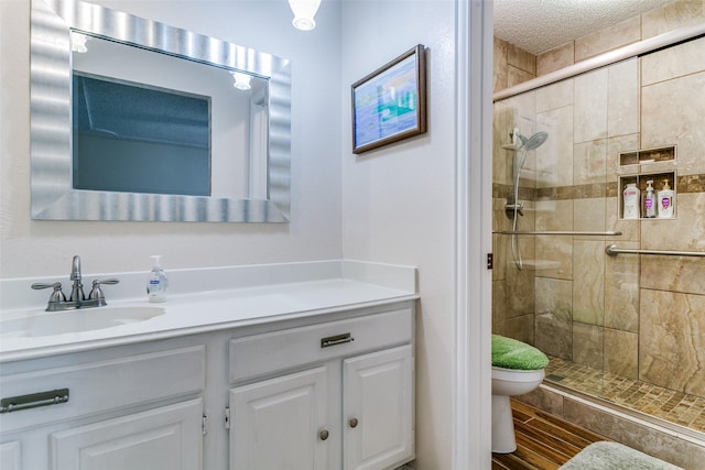 5312 Vermillion Trl, Arlington, TX 76017 - full bathroom with a shower stall, vanity, and a textured ceiling