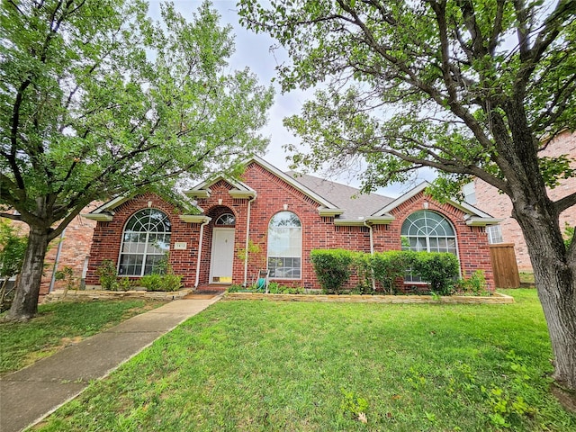 1412 Meadow Dr, Irving, TX 75063 - view of front of property featuring brick siding and a shingled roof