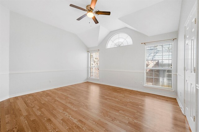 1412 Meadow Dr, Irving, TX 75063 - unfurnished room featuring ceiling fan, light wood finished floors, and lofted ceiling