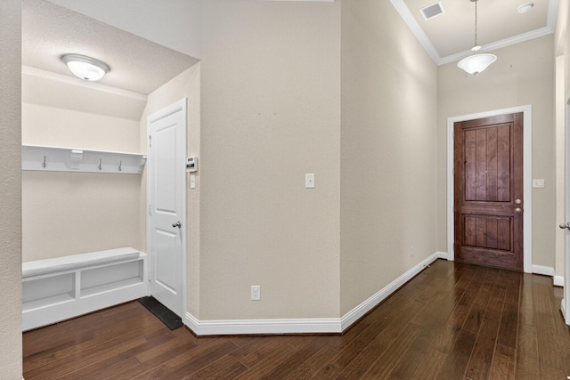 421 Fenceline Dr, Argyle, TX 76226 - entryway featuring crown molding and dark wood-type flooring