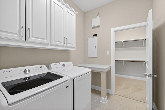 421 Fenceline Dr, Argyle, TX 76226 - laundry room featuring cabinet space, washer and dryer, light carpet, light tile patterned floors, and electric panel