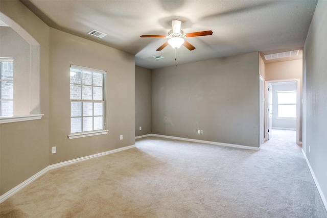 302 Blue Stem Ln, Aledo, TX 76008 - unfurnished room featuring carpet flooring, a ceiling fan, and arched walkways