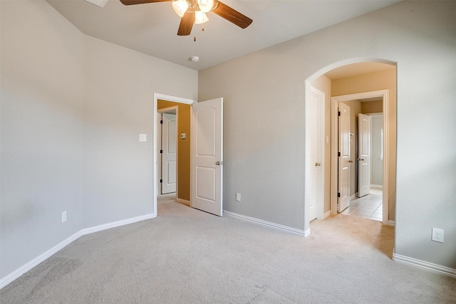 302 Blue Stem Ln, Aledo, TX 76008 - unfurnished bedroom with arched walkways, light carpet, and a ceiling fan