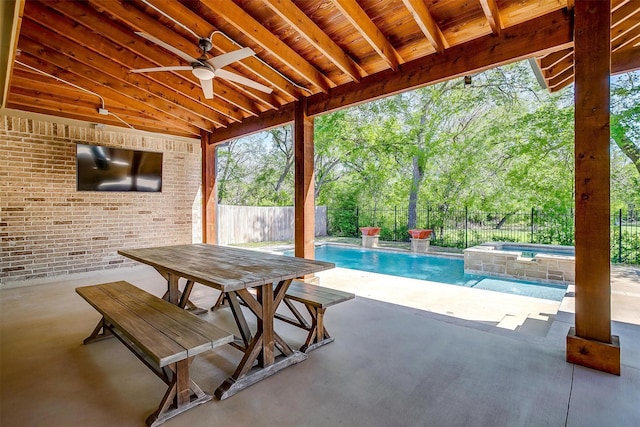 302 Blue Stem Ln, Aledo, TX 76008 - fenced backyard featuring a patio area, ceiling fan, a pool with connected hot tub, and view of scattered trees