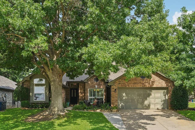 5229 Brettenmeadow Dr, Grapevine, TX 76051 - view of front of house featuring brick siding, a garage, driveway, a front lawn, and a shingled roof