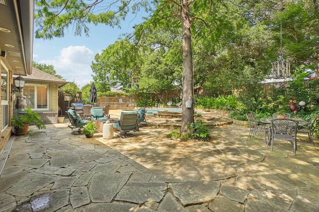 5229 Brettenmeadow Dr, Grapevine, TX 76051 - fenced backyard with outdoor dining space and a patio