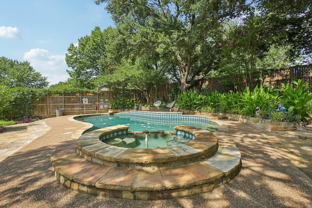 5229 Brettenmeadow Dr, Grapevine, TX 76051 - view of pool with a fenced backyard and a pool with connected hot tub