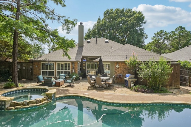 5229 Brettenmeadow Dr, Grapevine, TX 76051 - view of pool featuring a grill, a patio, a pool with connected hot tub, an outdoor living space, and outdoor dining area