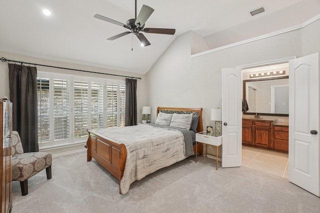 5229 Brettenmeadow Dr, Grapevine, TX 76051 - bedroom with lofted ceiling, light colored carpet, connected bathroom, and a ceiling fan