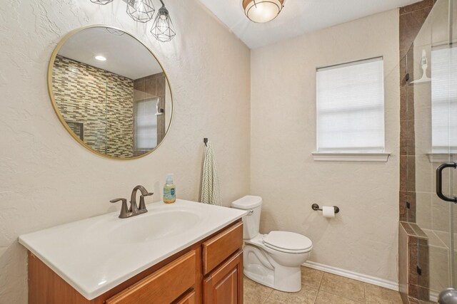 5229 Brettenmeadow Dr, Grapevine, TX 76051 - full bath with vanity, tile patterned flooring, a shower stall, and a textured wall