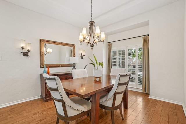 5229 Brettenmeadow Dr, Grapevine, TX 76051 - dining space with a chandelier and light wood finished floors