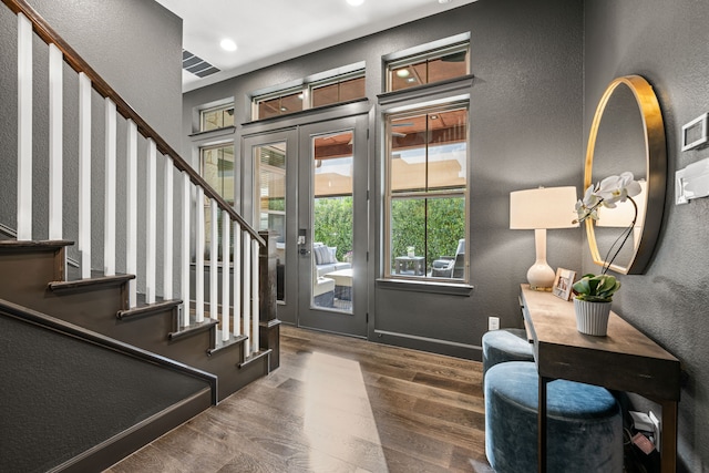 5495 Ashby Grove St, Dallas, TX 75209 - foyer with wood finished floors, a textured wall, french doors, stairway, and recessed lighting
