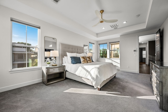5495 Ashby Grove St, Dallas, TX 75209 - carpeted bedroom featuring a raised ceiling, recessed lighting, and a ceiling fan