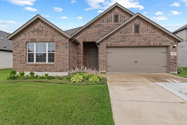 7118 Pampas Pl, Grand Prairie, TX 76804 - view of front of home with brick siding, driveway, a garage, and a front lawn