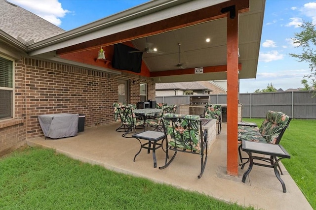 7118 Pampas Pl, Grand Prairie, TX 76804 - view of patio / terrace with exterior kitchen and ceiling fan