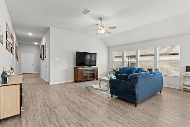 7118 Pampas Pl, Grand Prairie, TX 76804 - living room featuring a ceiling fan, light wood-type flooring, and lofted ceiling