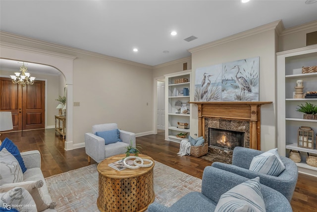 1078 Waters Edge Cir, Shreveport, LA 71106 - living area with crown molding, a premium fireplace, wood finished floors, a chandelier, and recessed lighting