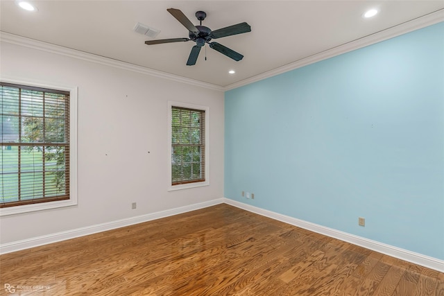 1078 Waters Edge Cir, Shreveport, LA 71106 - spare room with dark wood-style flooring, crown molding, recessed lighting, and a ceiling fan