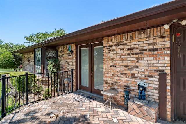3503 Red Bud Dr, Weatherford, TX 76087 - entrance to property with brick siding and french doors