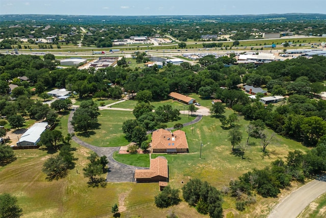 3503 Red Bud Dr, Weatherford, TX 76087 - aerial overview of property's location with a tree filled landscape
