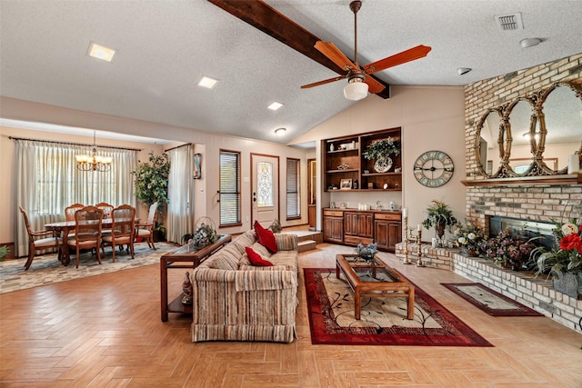 3503 Red Bud Dr, Weatherford, TX 76087 - living area with a textured ceiling, a chandelier, ceiling fan, and a brick fireplace
