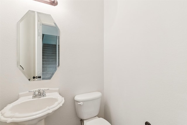 3442 Overhill Dr, Frisco, TX 75033 - half bath with a sink and toilet