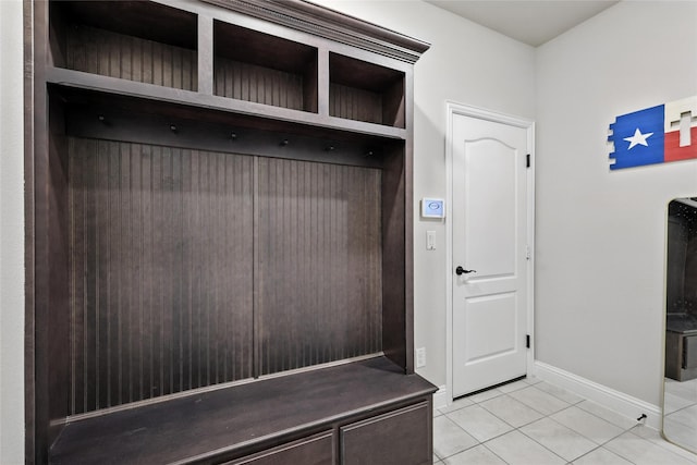 1328 Mission St, Aubrey, TX 76227 - mudroom with light tile patterned floors and baseboards