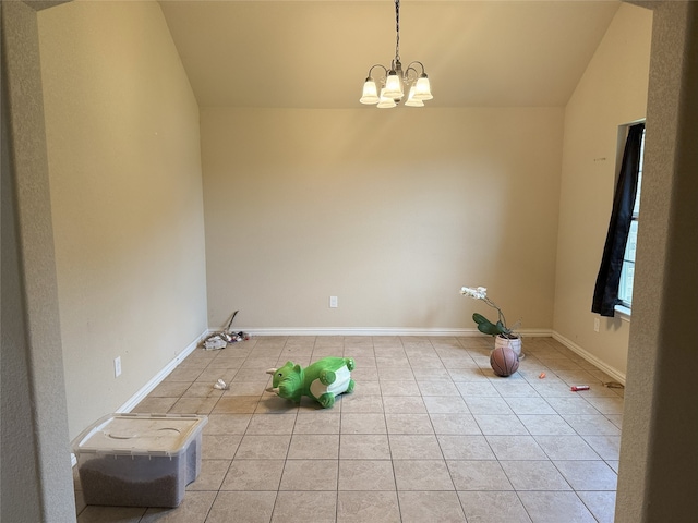 124 Brady Coleman Ln, Springtown, TX 76082 - unfurnished room with lofted ceiling, light tile patterned floors, and a chandelier