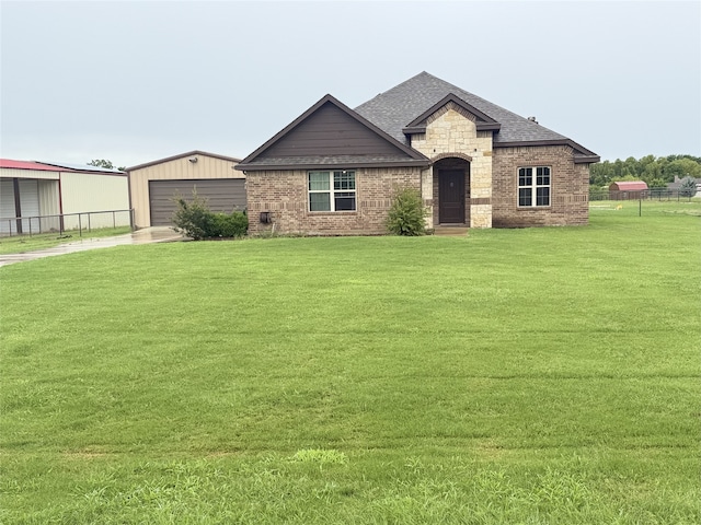 124 Brady Coleman Ln, Springtown, TX 76082 - view of front of home with an outbuilding, a garage, a shingled roof, brick siding, and stone siding
