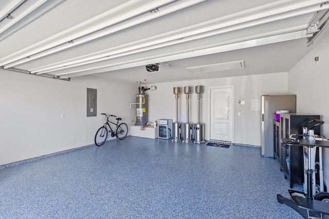 521 Bermuda Ave, Lancaster, TX 75146 - garage featuring electric panel, gas water heater, and a garage door opener