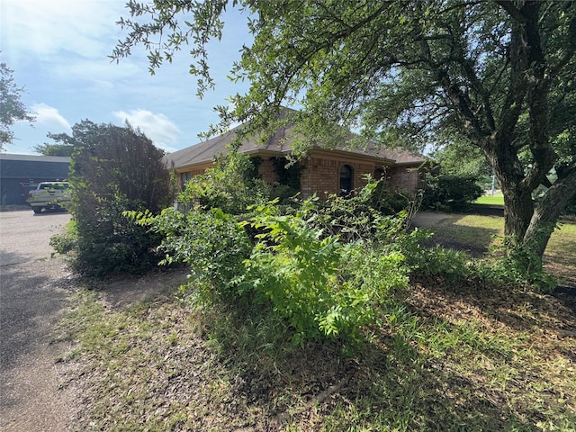 2720 Dorothy Dr, Keene, TX 76031 - view of side of home with brick siding