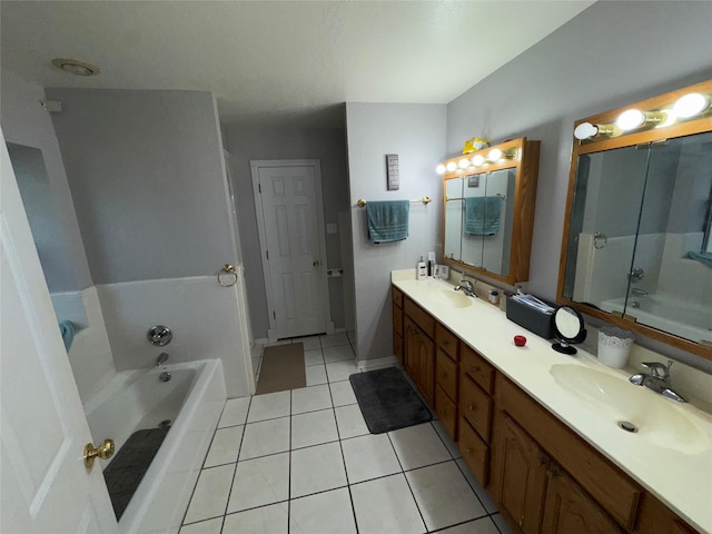 2720 Dorothy Dr, Keene, TX 76031 - full bath with a bathtub, double vanity, and tile patterned floors