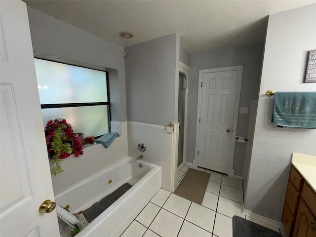 2720 Dorothy Dr, Keene, TX 76031 - bathroom with vanity, a jetted tub, tile patterned floors, and a shower