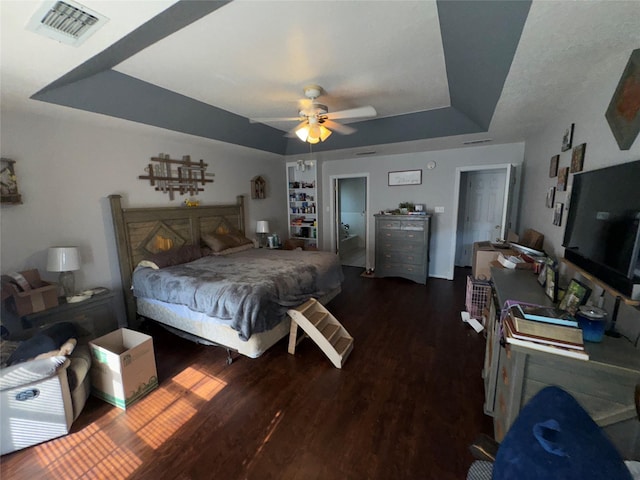 2720 Dorothy Dr, Keene, TX 76031 - bedroom with a raised ceiling, wood finished floors, and ceiling fan