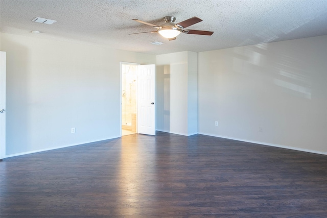 1565 Laurel Hall Ln, Little Elm, TX 75068 - unfurnished room featuring dark wood-type flooring, a ceiling fan, and a textured ceiling