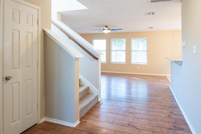1565 Laurel Hall Ln, Little Elm, TX 75068 - staircase with ceiling fan and wood finished floors