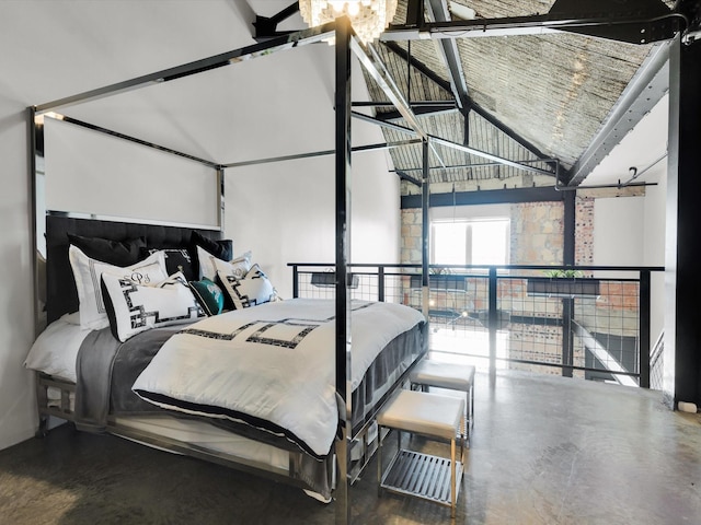 1122 Jackson St Unit 1103, Dallas, TX 75202 - bedroom with high vaulted ceiling and finished concrete floors