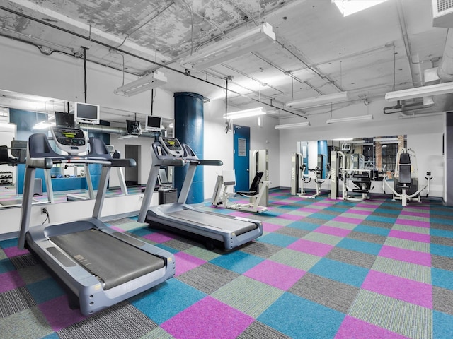 1122 Jackson St Unit 1103, Dallas, TX 75202 - exercise room featuring carpet