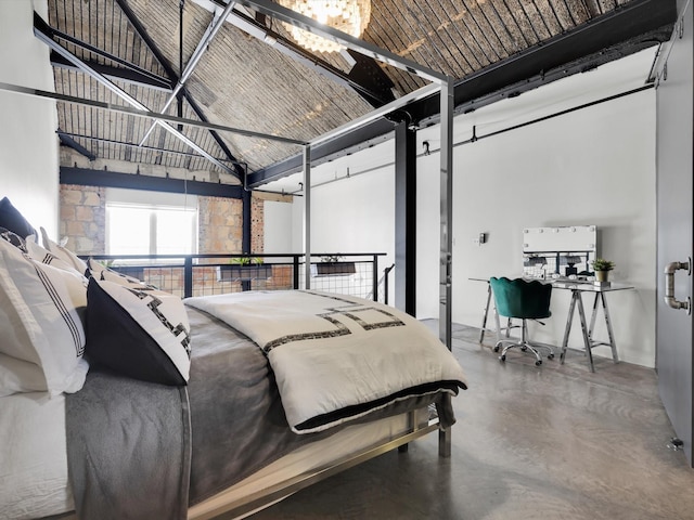 1122 Jackson St Unit 1103, Dallas, TX 75202 - bedroom featuring high vaulted ceiling and concrete flooring