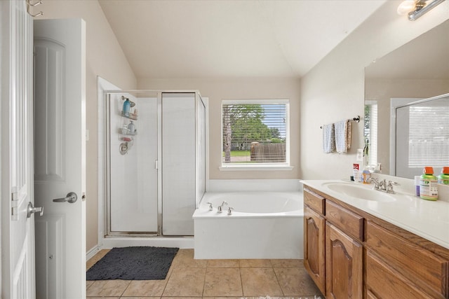 1365 Clear Meadow Ct, Rockwall, TX 75087 - bathroom featuring vaulted ceiling, vanity, a bath, a stall shower, and tile patterned floors