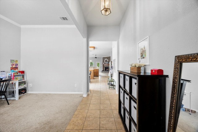 1365 Clear Meadow Ct, Rockwall, TX 75087 - corridor featuring light tile patterned flooring, light carpet, and crown molding