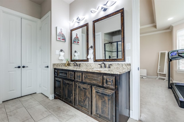 751 Devonshire Ct, Prosper, TX 75078 - bathroom featuring double vanity, an enclosed shower, and ornamental molding